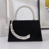 Black tri-fold handbag with