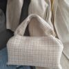 Small beige Chanel-style