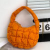Orange zipper and bag are the