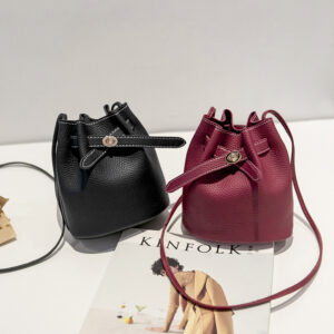 Guangzhou Source 2026 New Simple Bucket Wide Strap Lock Small Korean Style Casual Solid Color Shoulder Bag