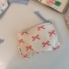 Small pink bow on white