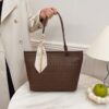 Brown silk scarf included