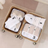 White 7-piece travel organizer