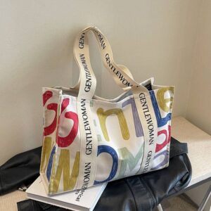 Fashion canvas letters tassel shoulder tote denim material large capacity shopping bag women