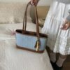 Dark blue with a strap