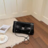 Black silver handbag