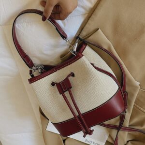 Wholesale women’s 2026 autumn new European and American fashion bags crossbody drawstring stitching canvas portable