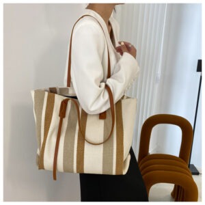 Korean style large capacity women’s shoulder female 2026 new simple vertical stripes casual tote bag fashion handbag