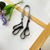 Black and white shoulder strap