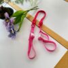 Red shoulder strap