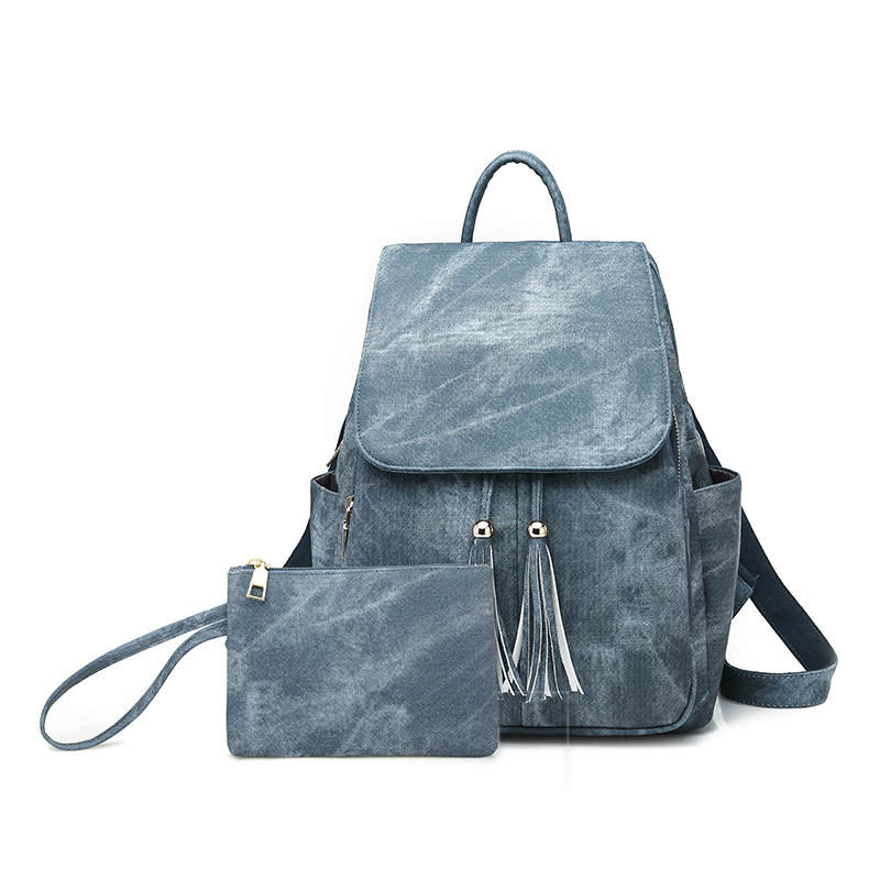 Fashion women's new large capacity bag tassel backpack