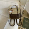 Khaki-colored hanging rack