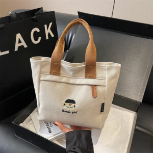 Cartoon Embroidered Canvas Basket 2026 New Versatile Casual Mommy Lunch Bag Fashionable Handbag Trendy